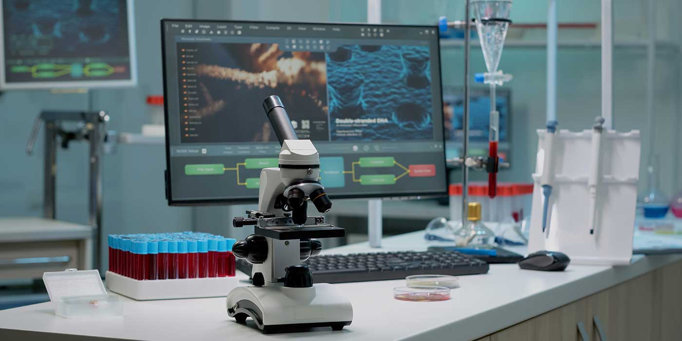 Laboratory medical equipment and computer screen showing research
