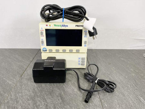 Front picture of the Welch Allyn 206EL Propaq Encore Vital Signs Monitor With a power cord placed on top of it