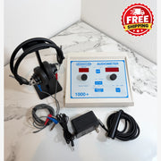 A portable audiometer testing device with a beige control panel, blue markings, black headphones on a stand, test leads, and a power adapter, arranged on a white marble-patterned surface against a white wall. A red 'FREE SHIPPING' badge is in the top right corner.