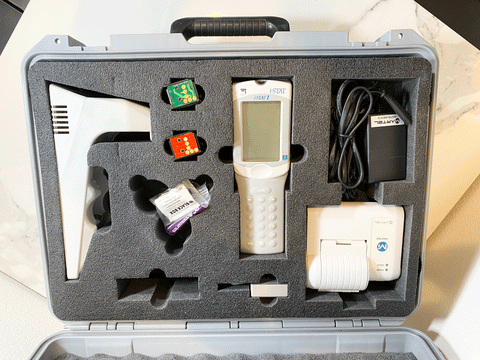Picture of the Abbott i-STAT 1 300 Handheld Clinical Blood Hematology Analyzer inside a case