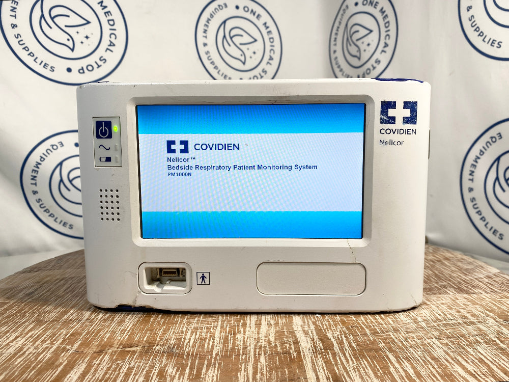 Picture of Covidien Nellcor PM1000N Respiratory Monitor with screen displaying 'Covidien'