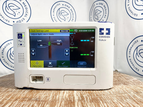 Picture of Covidien Nellcor PM1000N Respiratory Monitor with digital screen.