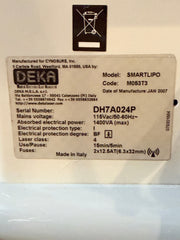 A close-up of a product label sticker on a white surface. The label shows the brand DEKA and indicates the product is a SMARTLIPO model with serial number DH7A024P.