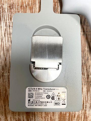 Metallic transducer with label