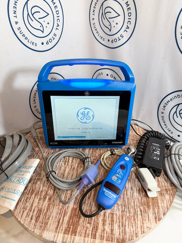Blue GE Carescape Dinamap VC150 Vital Signs Monitor device with screen on a wooden surface, surrounded by cables and connectors, with GE logo.