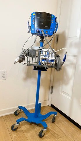 GE Dinamap CareScape V100 Vital Signs Monitor on a stand and wheels