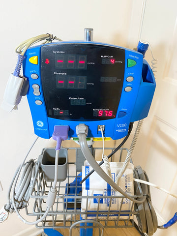 GE Dinamap CareScape V100 Vital Signs Monitor with digital display and cables