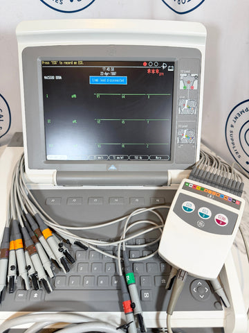 Closed up picture of GE Mac 5500 HD ECG / EKG Machine with power and accessories.