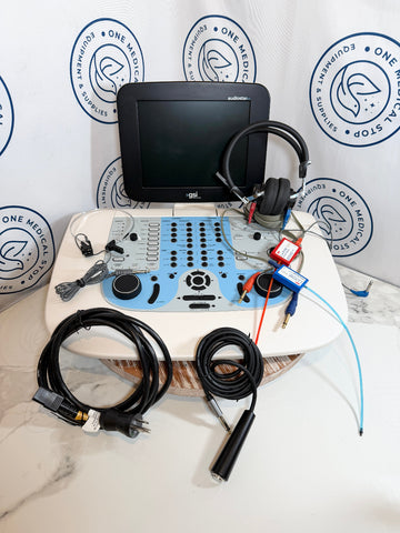 GSI AudioStar Pro Clinical Audiometer with monitor, cables, and headphones