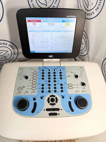 A GSI AudioStar Ultrasound machine with a white and light blue control panel and a black screen displaying real-time ultrasound settings, set against a white backdrop with circular logos.