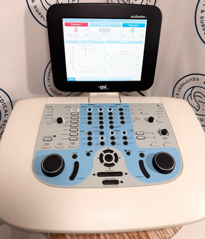 GSI AudioStar Pro Clinical Audiometer  with a screen displaying data on a white surface.