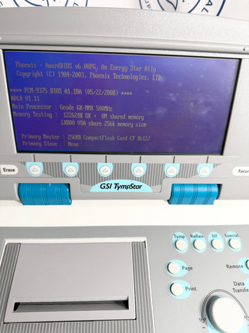 GSI TympStar electronic device with a blue screen displaying text