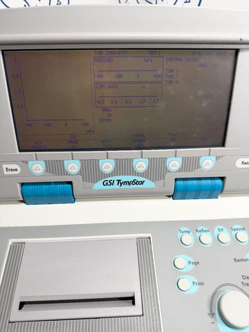 GSI TympStar electronic device with digital display and control buttons.