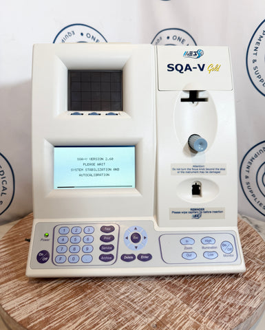 Medical device with digital display and control panel on a wooden surface
