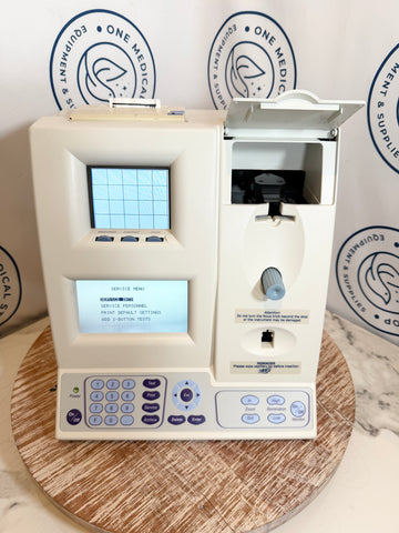 Medical device on a wooden stand with 'One Medical' branding in the background