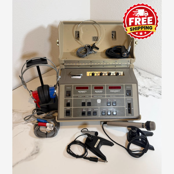 A Maico MA41 Portable Diagnostic Audiometer device with an open beige carrying case, shown on a white marble-patterned surface with various attached cables, headphones, and a microphone. A red and yellow 'FREE SHIPPING' badge is in the top right corner.