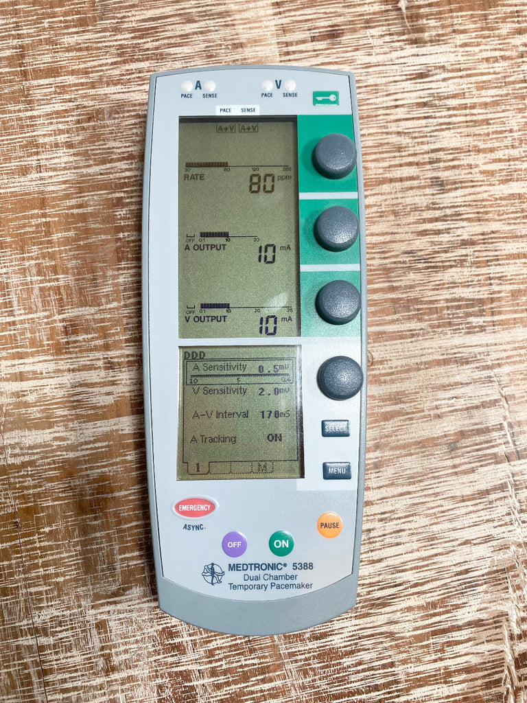 Medtronic 5388 Dual Chamber Temporary External Pacemaker  device with digital display on a wooden surface