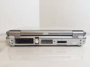 A Mindray portable ultrasound machine  shown closed from the back, displaying ports and vents on a white reflective surface against a white wall.