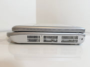 A Mindray portable ultrasound machine shown closed from the side, resting on a white reflective surface against a white wall.