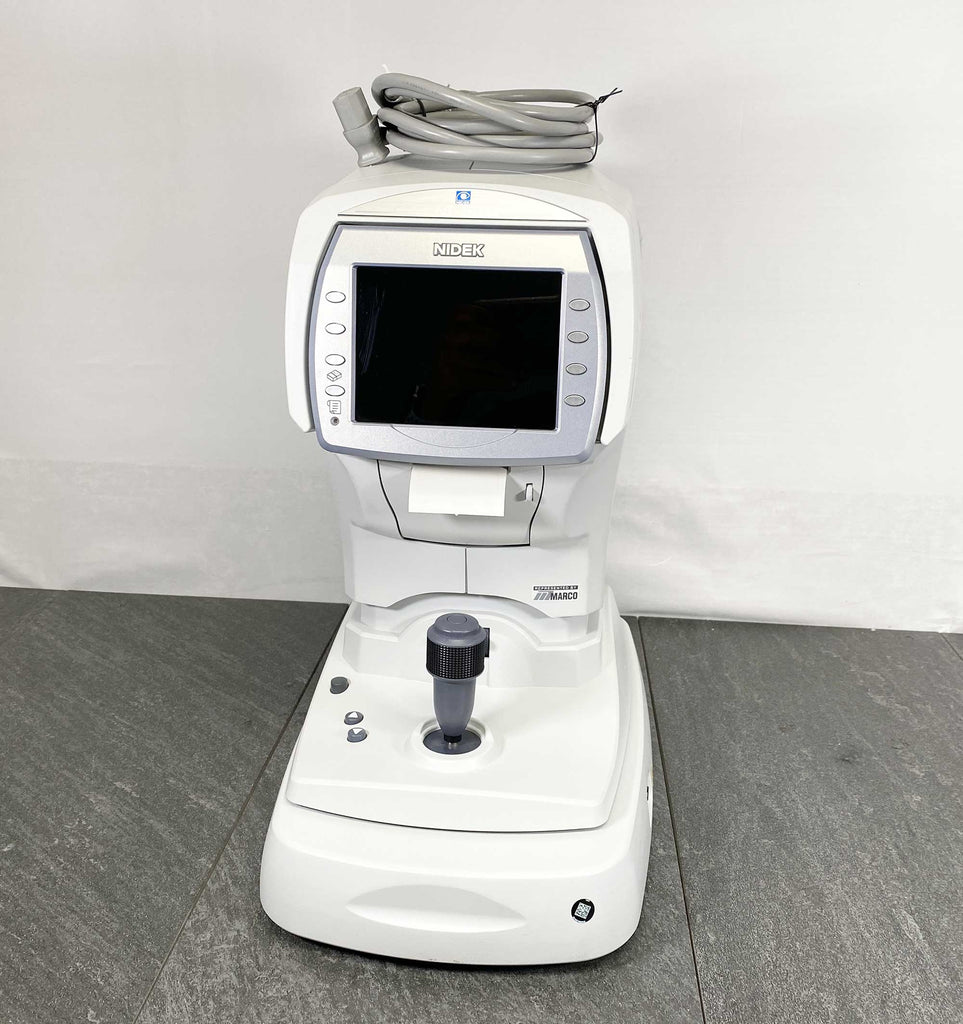 Front picture of the NIDEK NT-510 Non Contact Tonometer with power cord on it