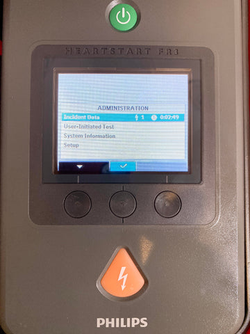 Philips Heartstart FR3 AED Defibrillator with display screen and control buttons.