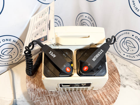 Sterilizer with two black compartments labeled 'ApeX' and 'Steri-Stat' on a white background with branding.