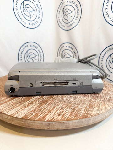 Sonosite Titan Ultrasound device on a wooden surface 