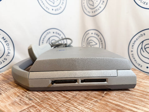 Sonosite Titan Ultrasound device on a wooden surface