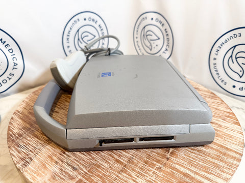 Sonosite Titan Ultrasound device on a wooden surface 