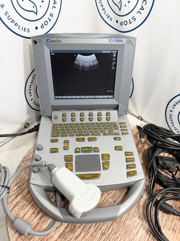 Sonosite Titan Ultrasound machine with cables on a wooden surface