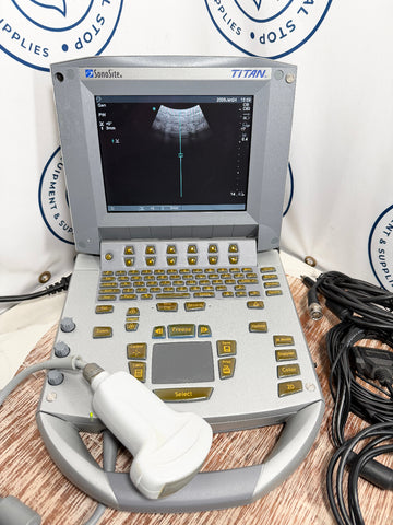 Sonosite Titan Ultrasound machine with a screen and control panel on a wooden surface, with 'Sanoitec' branding.