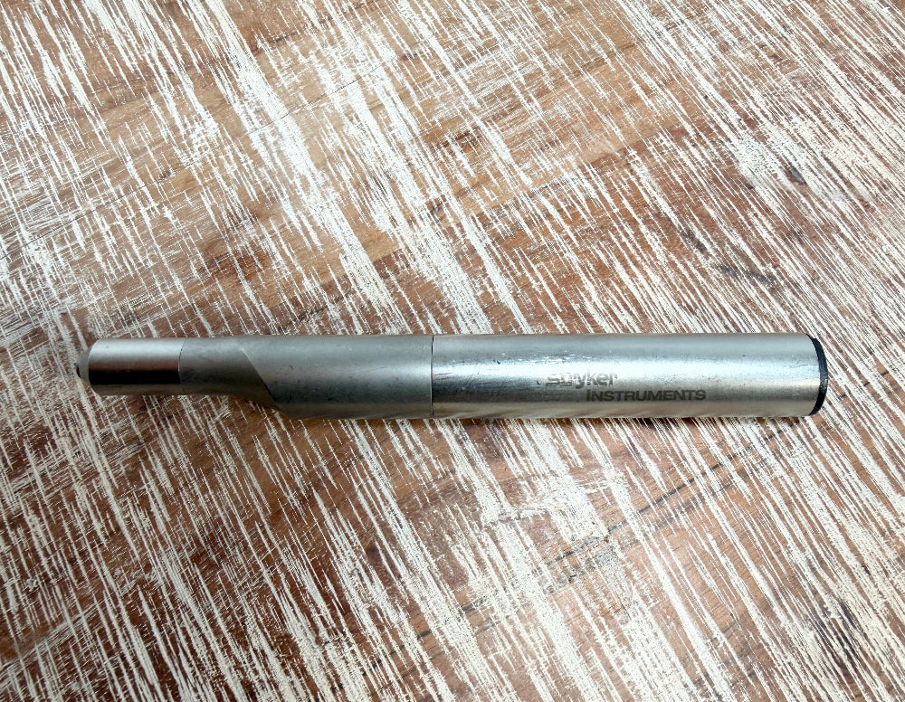 Stryker Reciprocating Saw on wood surface