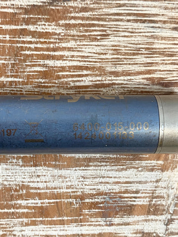 Picture of Stryker RemB Electric Micro Drill 6400-015-000 with text on a wooden surface
