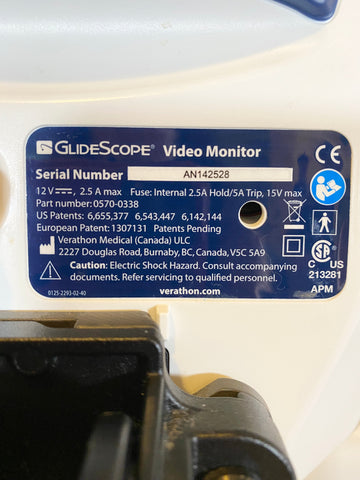 GlideScope video monitor with a label displaying technical details and branding.