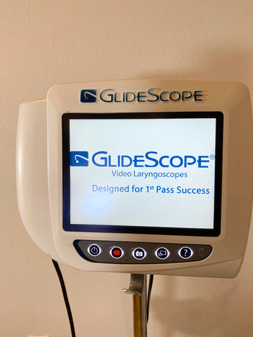 GlideScope video laryngoscope with screen displaying the GlideScope logo and text.