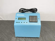 Front picture for Brandel Cell Harvester CH-055 Control Module with a power cord placed on top 