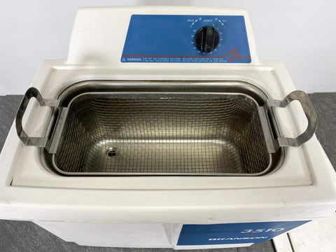 Picture of the basket inside of the Branson 3510 Ultrasonic Cleaner 