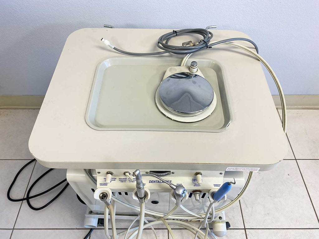 Picture of the DentalAire Dental Machine with Air Compressor  with a foot pedal 