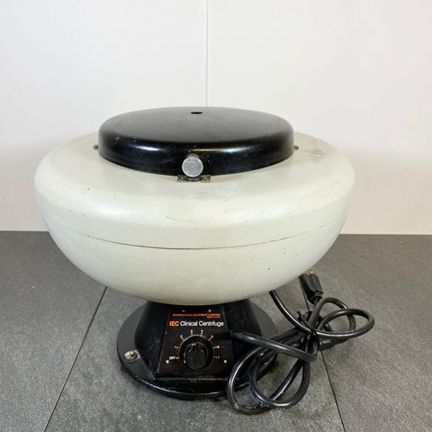 Front picture of IEC Clinical Centrifuge Model 428 with power cord next to it 