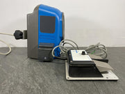 Side picture of the Medtronic XOMED XPS 3000 Irrigation Console with a foot switch
