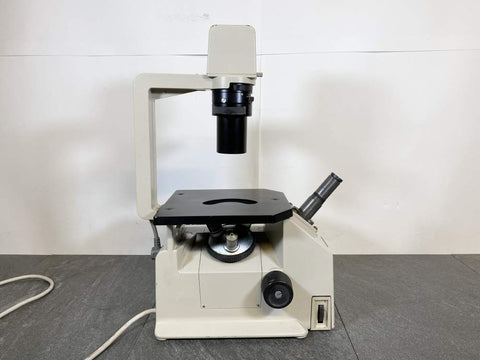 Side picture of the Nikon TMS Inverted Phase Contrast Microscope w/ 3 Objectives