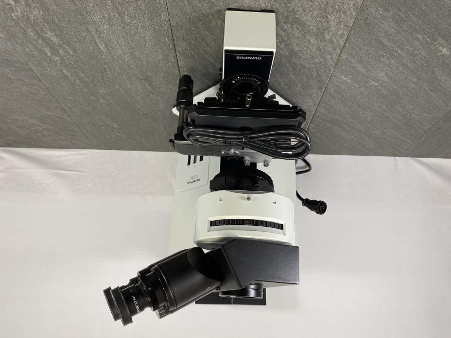 Front picture for Olympus BX60 F5 Microscope w Mercury Lamp U-ULS100 HG and U-LH100 with a power cord placed on top