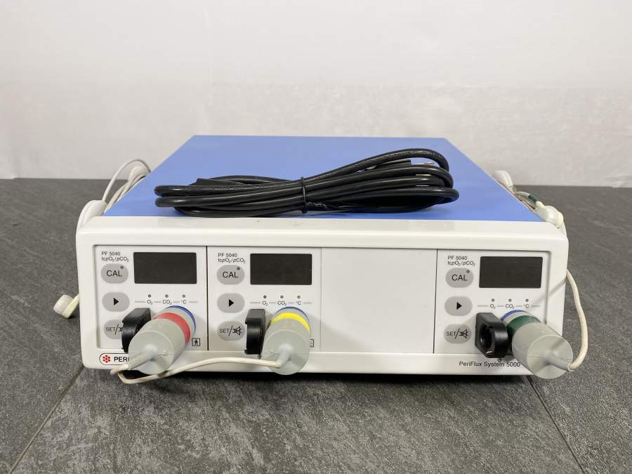Front picture for Perimed Periflux System 5000 Type PF5002 With 3 Probes with a power cord placed on top