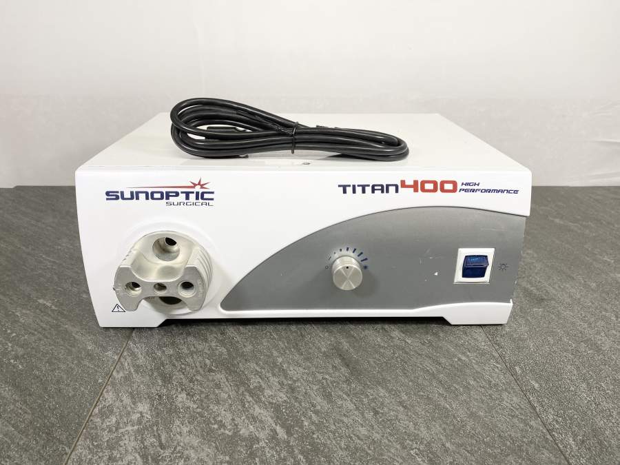 Front picture for Sunoptics Surgical Titan 400HP Light Source S400T with a power cord placed on top