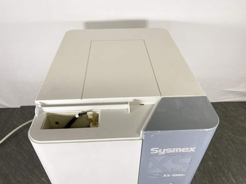 Picture of the top of the Sysmex XS-1000i Automated Hematology Analyzer  that shows the lid is missing